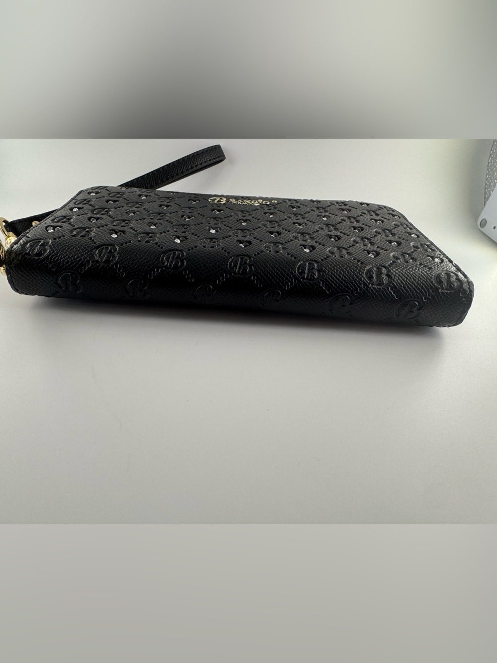 BRANGIO Italy WRISTLET WALLET
MILLIONAIRE VEGAN LEATHER CRYSTAL WRISTLET WALLET - Picture 3 of 12